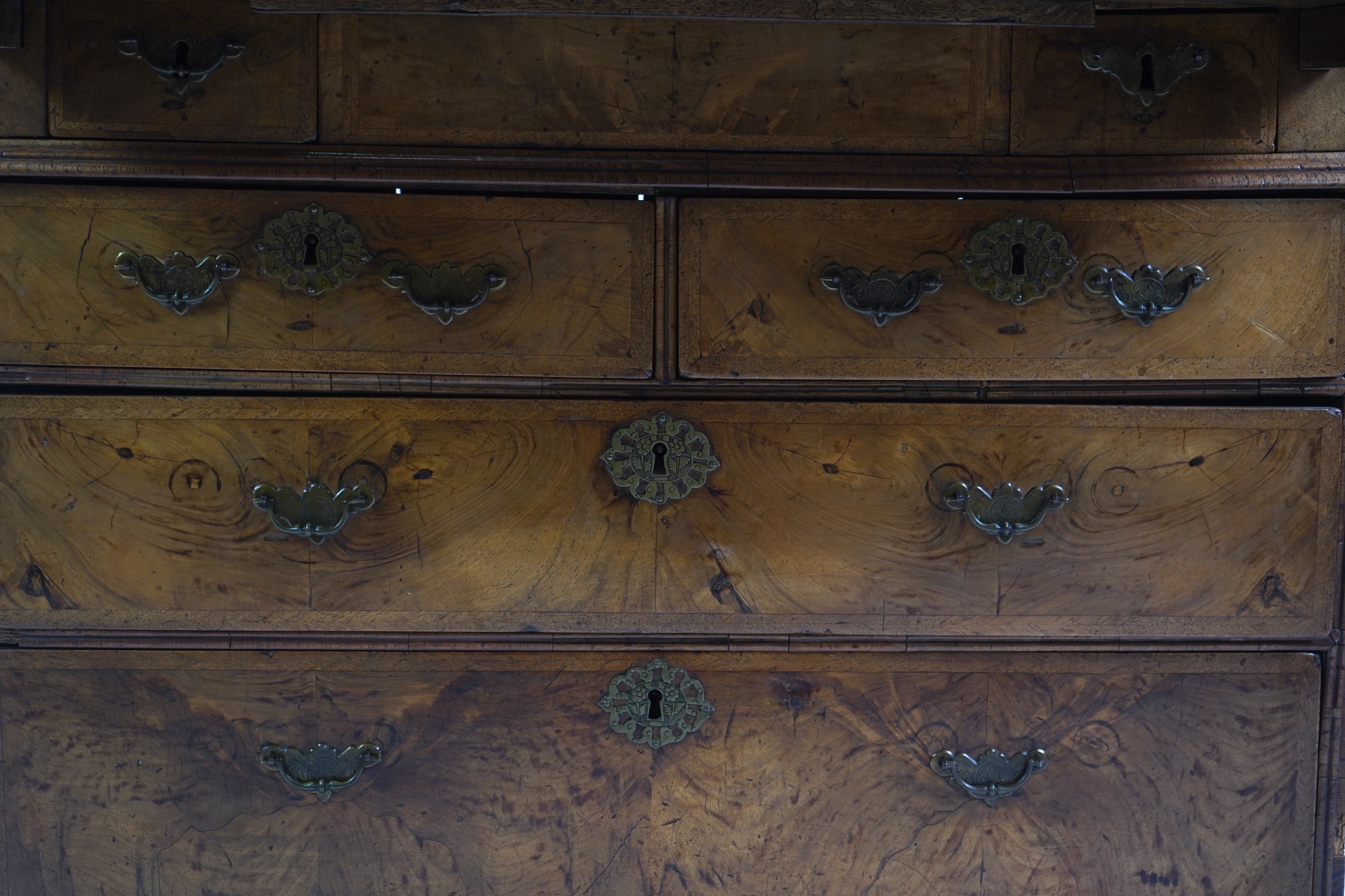 A George I feather banded walnut bureau